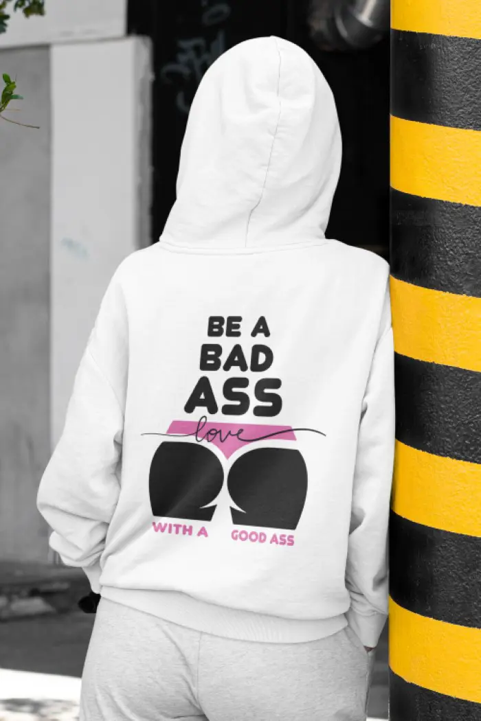 mockup-of-the-back-of-a-woman-wearing-a-hoodie-in-the-street-m421